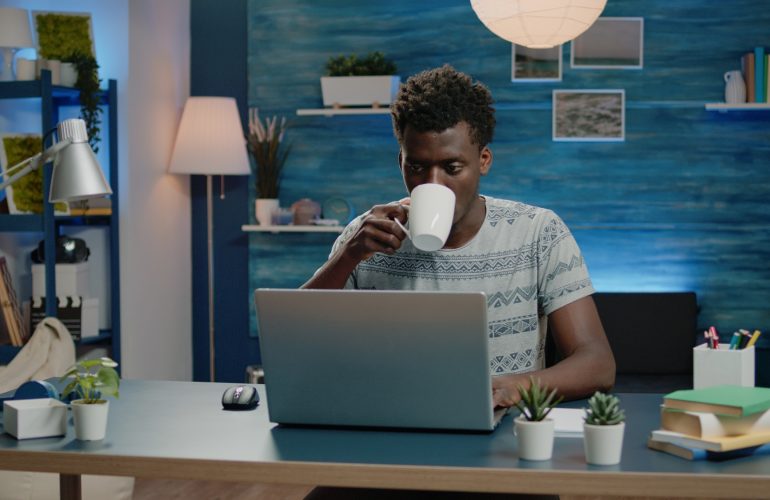 Freelance employee working from home on laptop