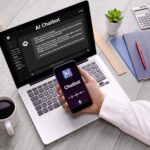 Professional employee using AI chatbot technology on a laptop in a modern office workspace